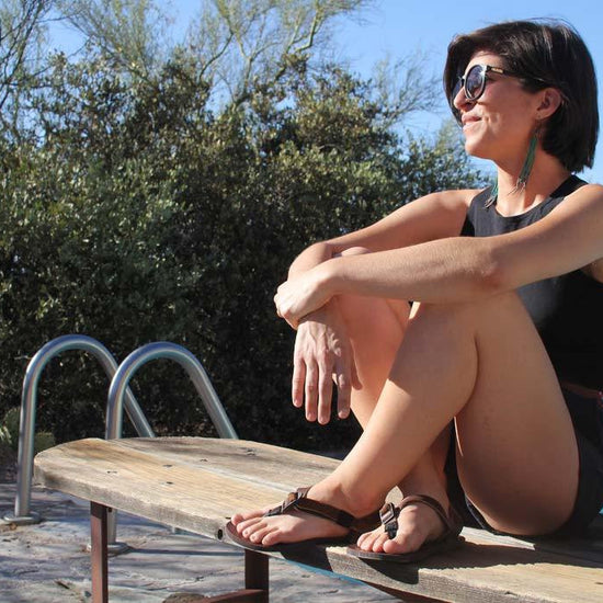 Shamma Sandals All Browns lady by pool side in sandals