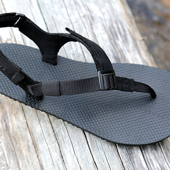 Shamma Warriors sandals product image on wood