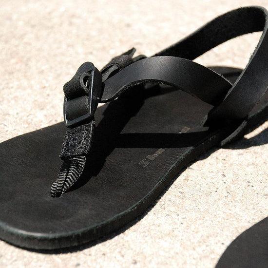 Shamma Sandals All Blacks on ground