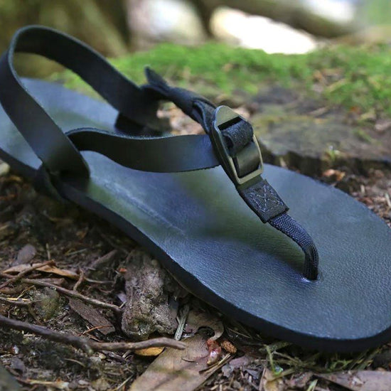 Shamma All Blacks sandal on forest floor