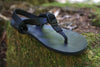 Shamma All Blacks sandal on mossy rock