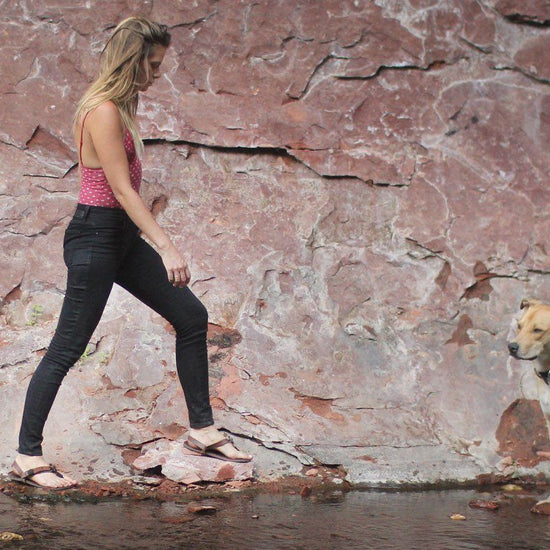 All Browns sandals woman walking in canyon with dog