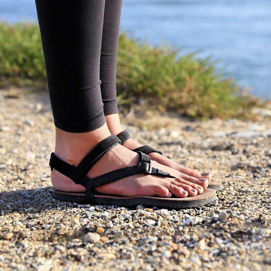 Woman standing in Shamma Sandals with Power Straps