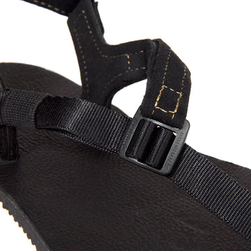 The Buckle on the Black Leather Shamma Power Sandals.