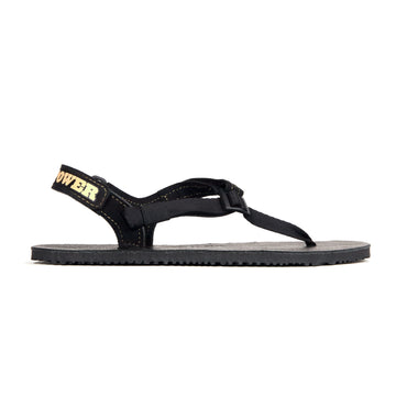 Alternate side view of the black sole Shamma Power Sandal.
