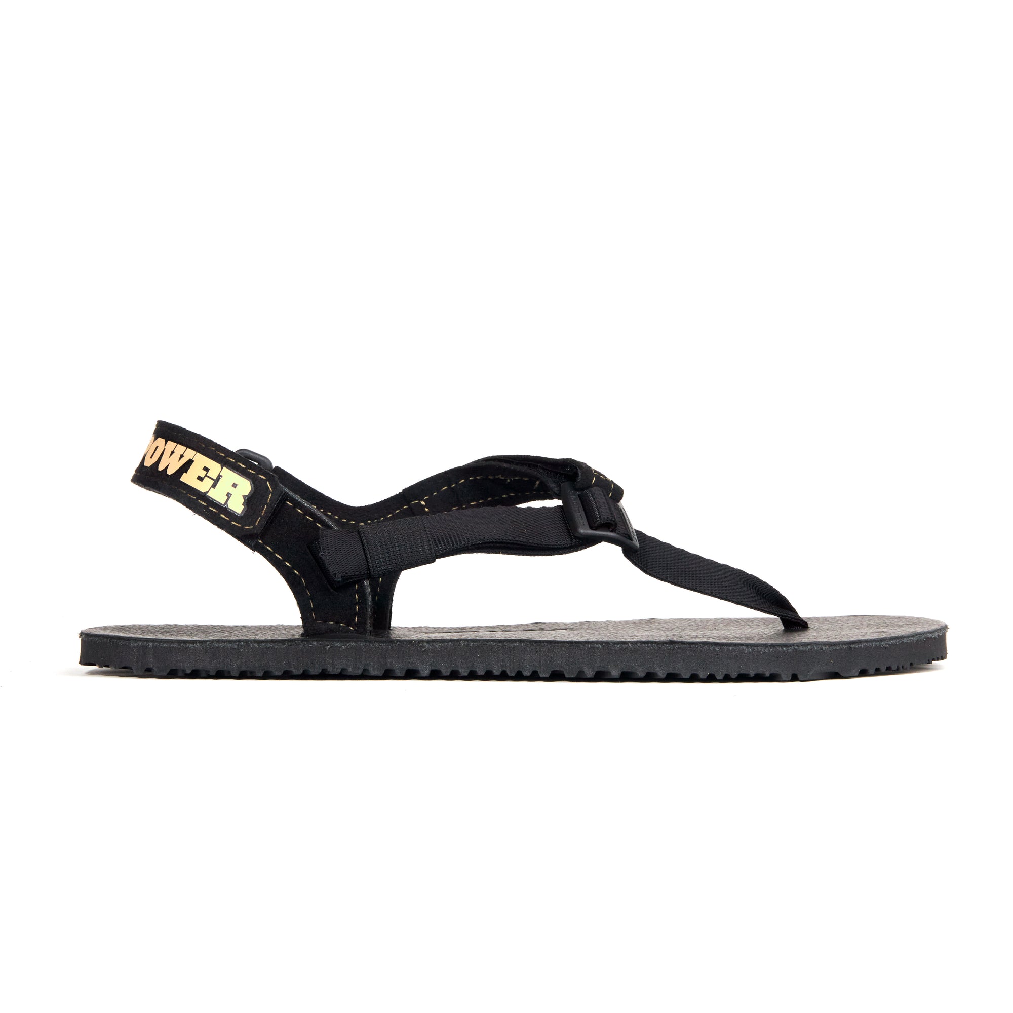 Alternate side view of the black sole Shamma Power Sandal.