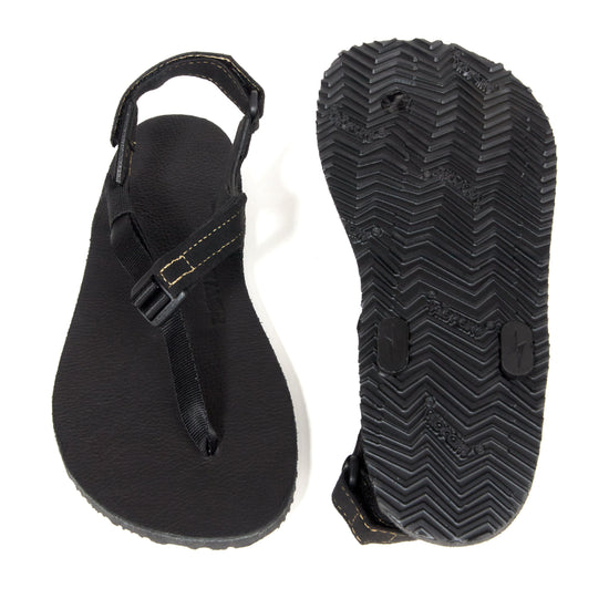 top and bottom view of the leather Shamma Power Sandal with black soles.