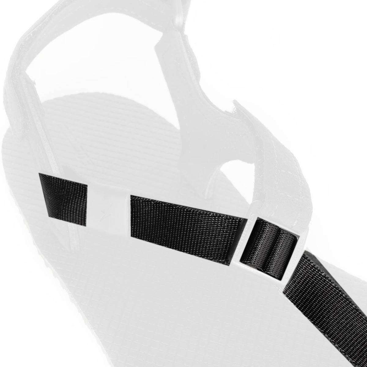Shamma Elite Toe Strap on an Elite sandal: looped round the heel strap, under the keeper and through the buckle toward the toe, with the rest of the sandal faded