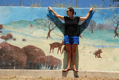 Woman wearing Shamma All Browns mural
