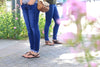 Women standing in All Browns sandals